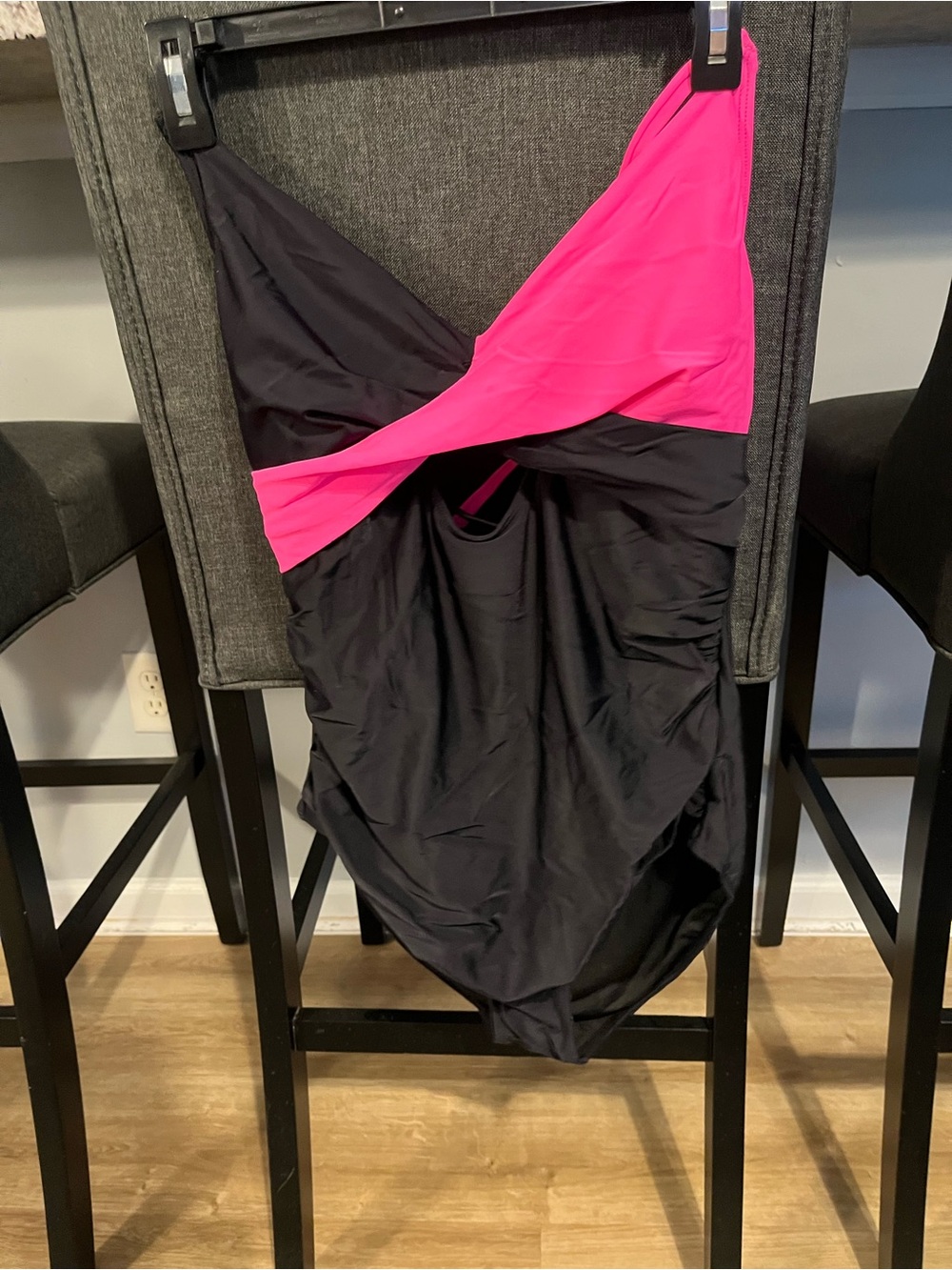 Sleek Black One-Piece Swimsuit with Hot Pink Accent